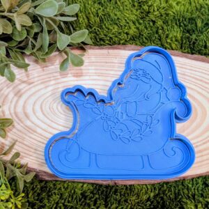Santa and sleigh Stamp And Cutter Set